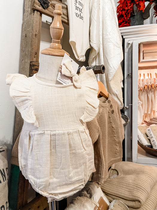 baby bubble romper in cream