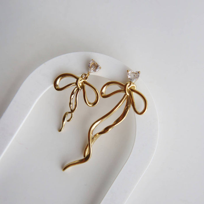 keira bow dangle earrings