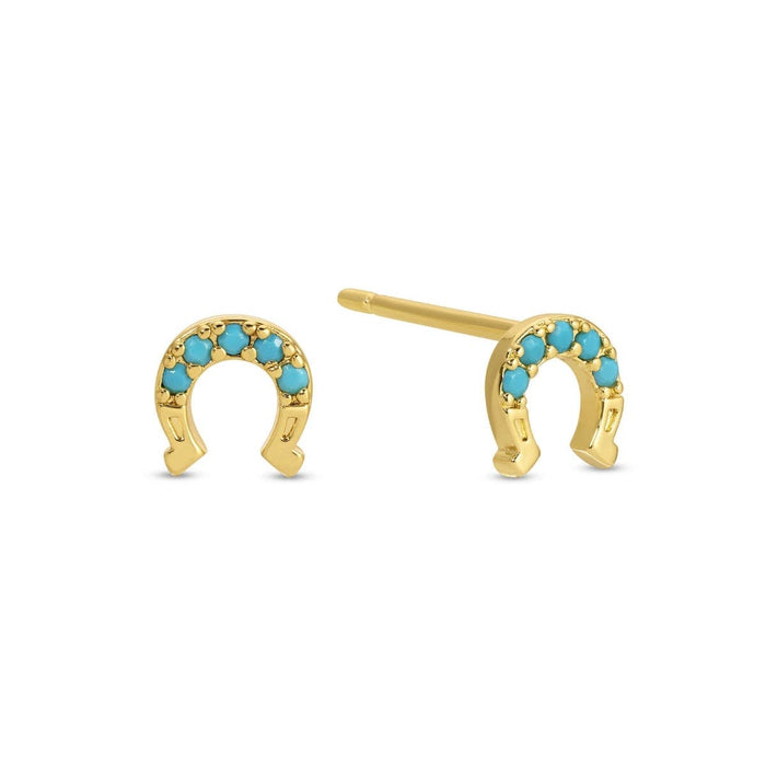 turquois horseshoe studs on velvet