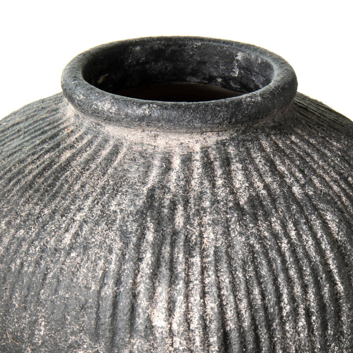 round terracotta dark vase