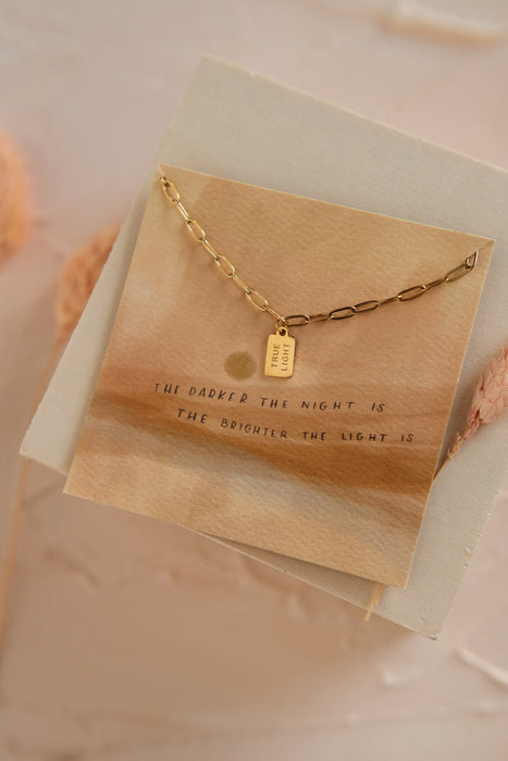 true light gold necklace