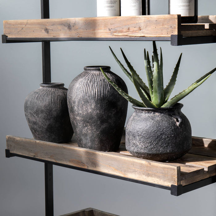 round terracotta dark vase
