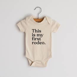 "First Rodeo" Baby Bodysuit in Cream