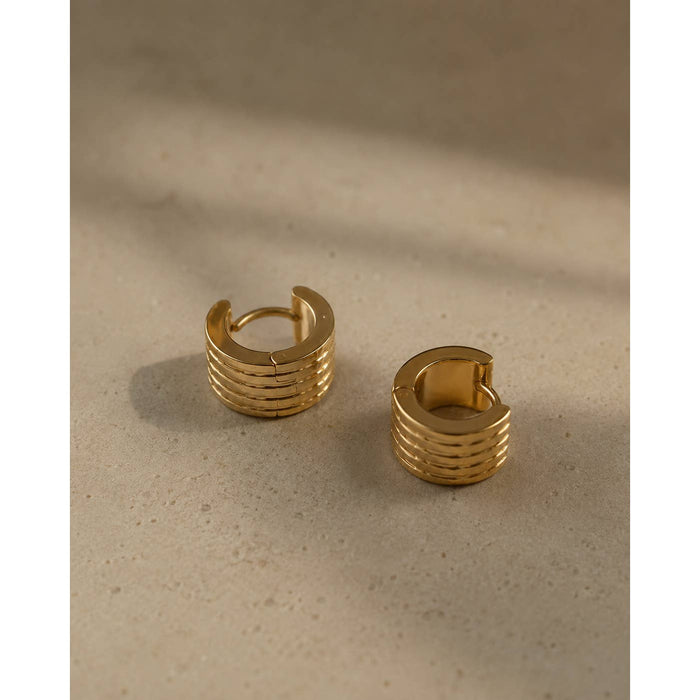 mila huggies, gold textured
