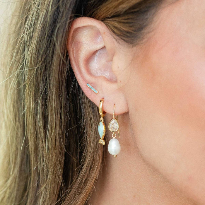 turquois pavè studs on velvet