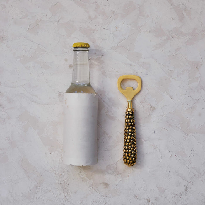 cast brass beaded bottle opener