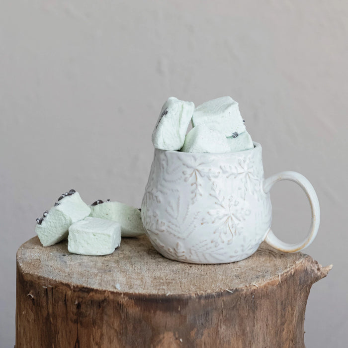 white stoneware snowflake mug