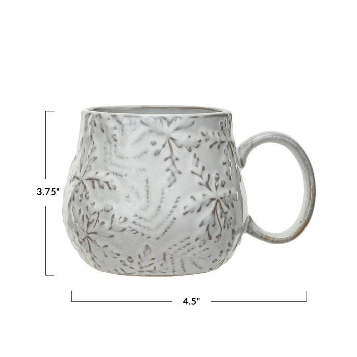 white stoneware snowflake mug