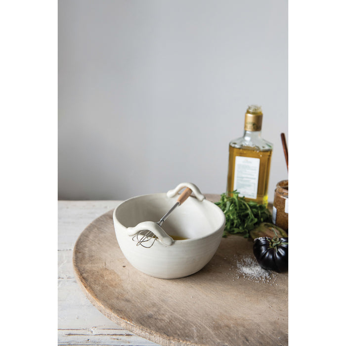 Stoneware bowl with whisk